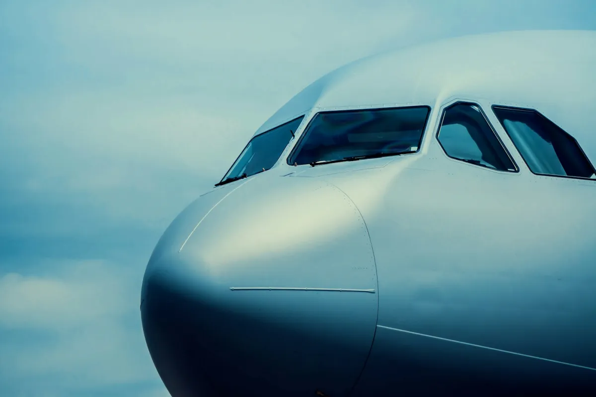 Close-up of an airplane nose and cockpit windows